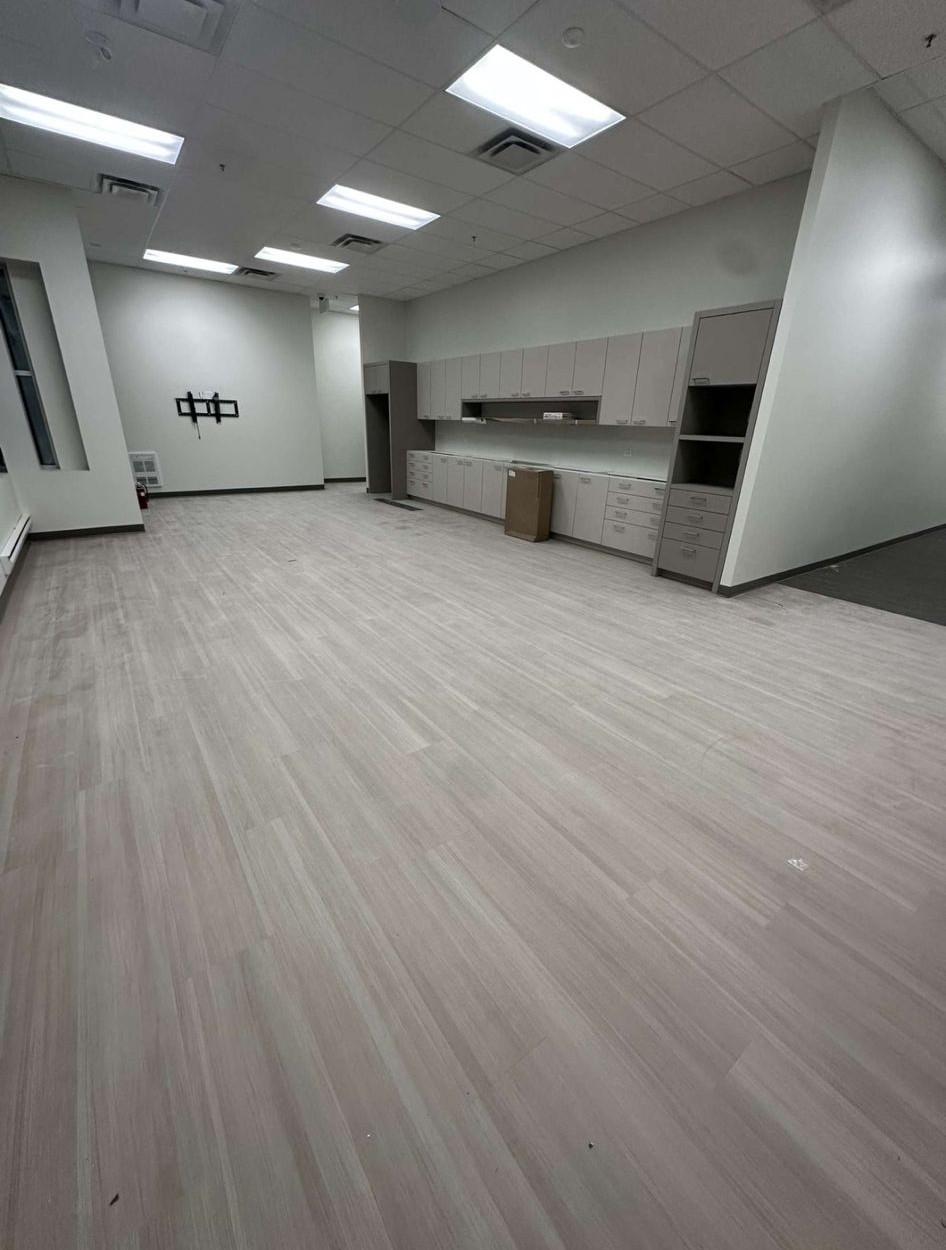Luxury vinyl plank flooring installation in Toronto bathroom