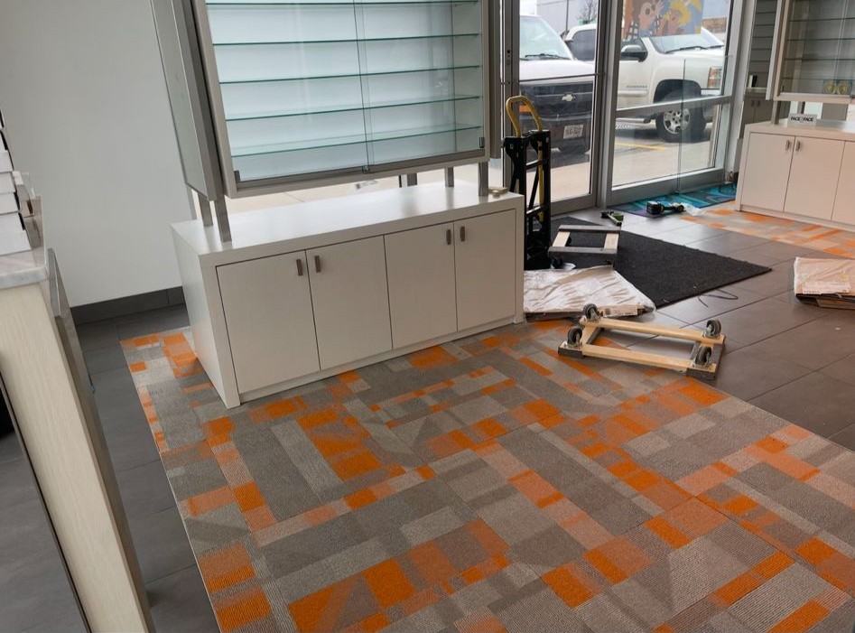 Commercial carpet tile flooring installation Toronto-Markham — custom colour-block modular carpet tile design
